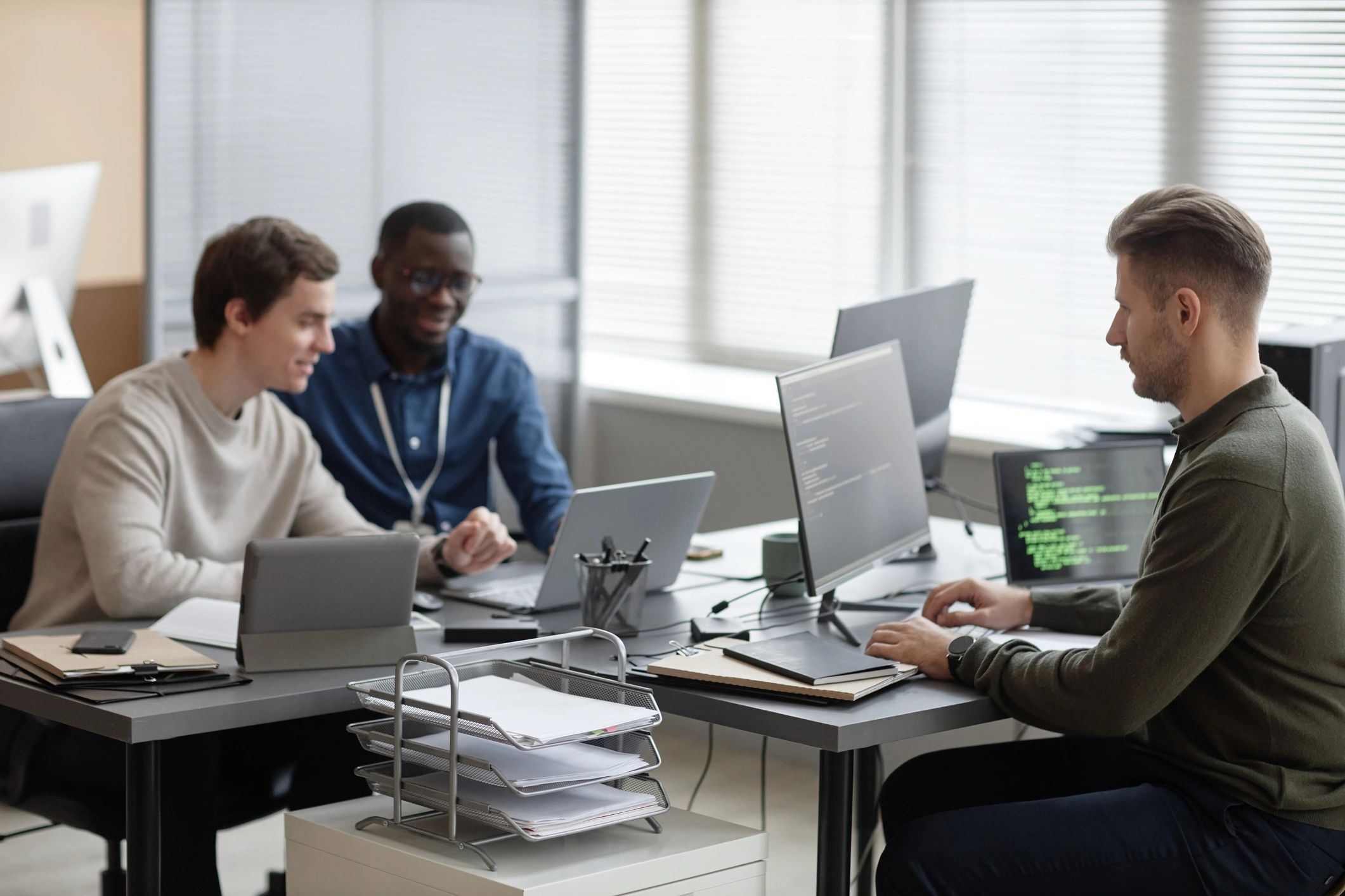 IT professionals working in a modern office
